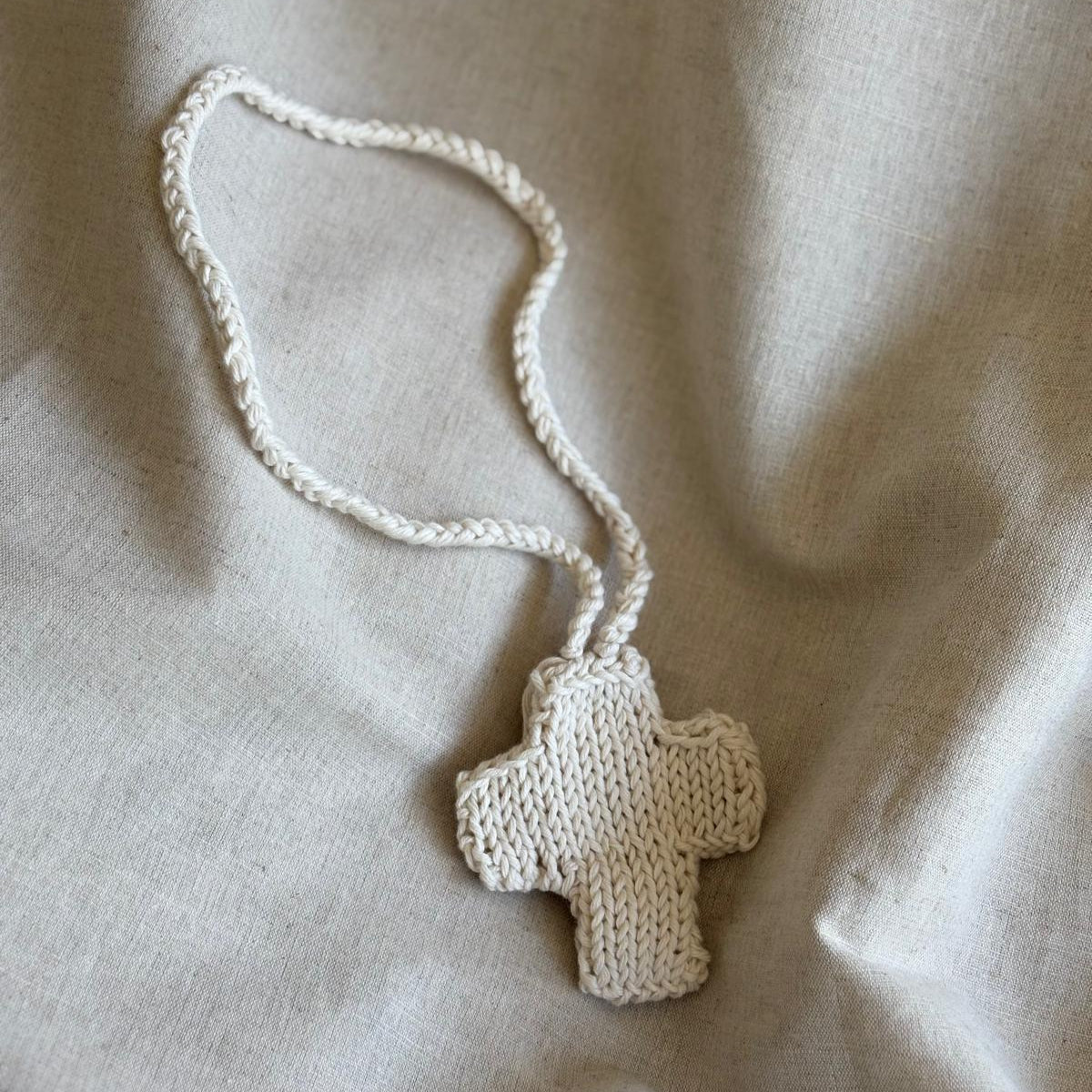 cruz-punto-recien-nacido